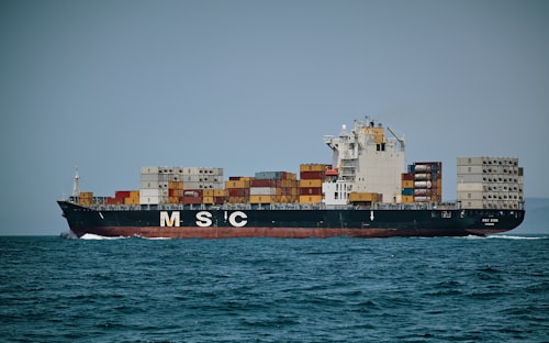 Cargo ship carrying containers for freight forwarding